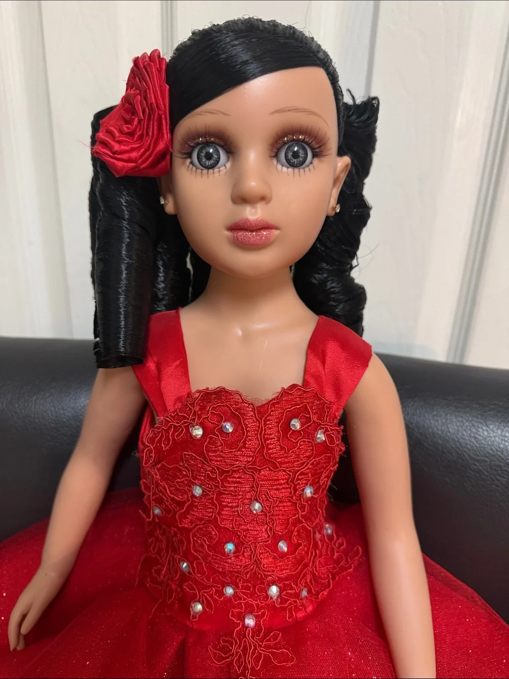 24-inch Quinceañera Keepsake Doll Wearing A Layered, sparkly Red Gown.